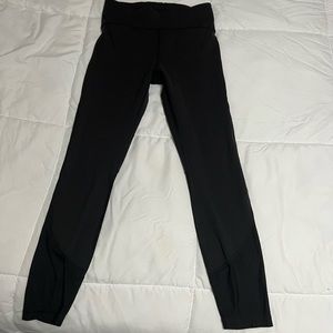 Lululemon size 6 black leggings. Sheer on sides